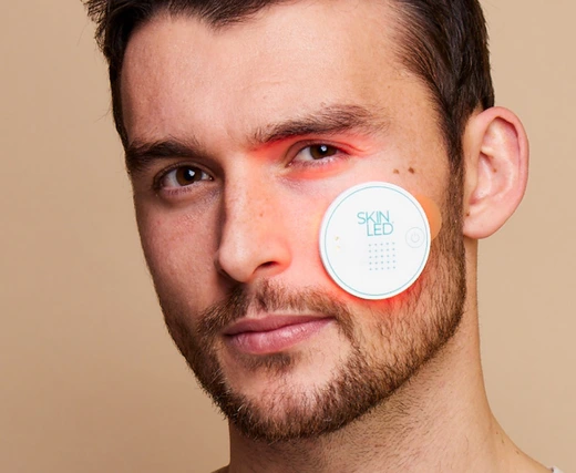 Male model using iSmart Pigmentation LED Patch for targeted skin tone correction